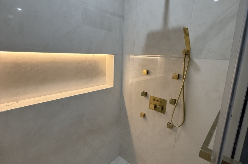 Luxury Bathroom With Custom Vanity & LED Shower Niche