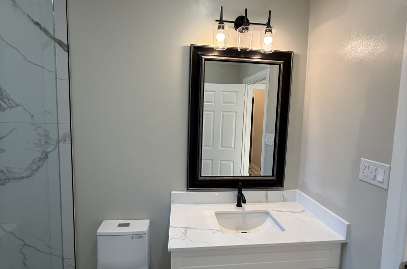 Laundry Room Converted Into a Complete 3-Piece Bathroom